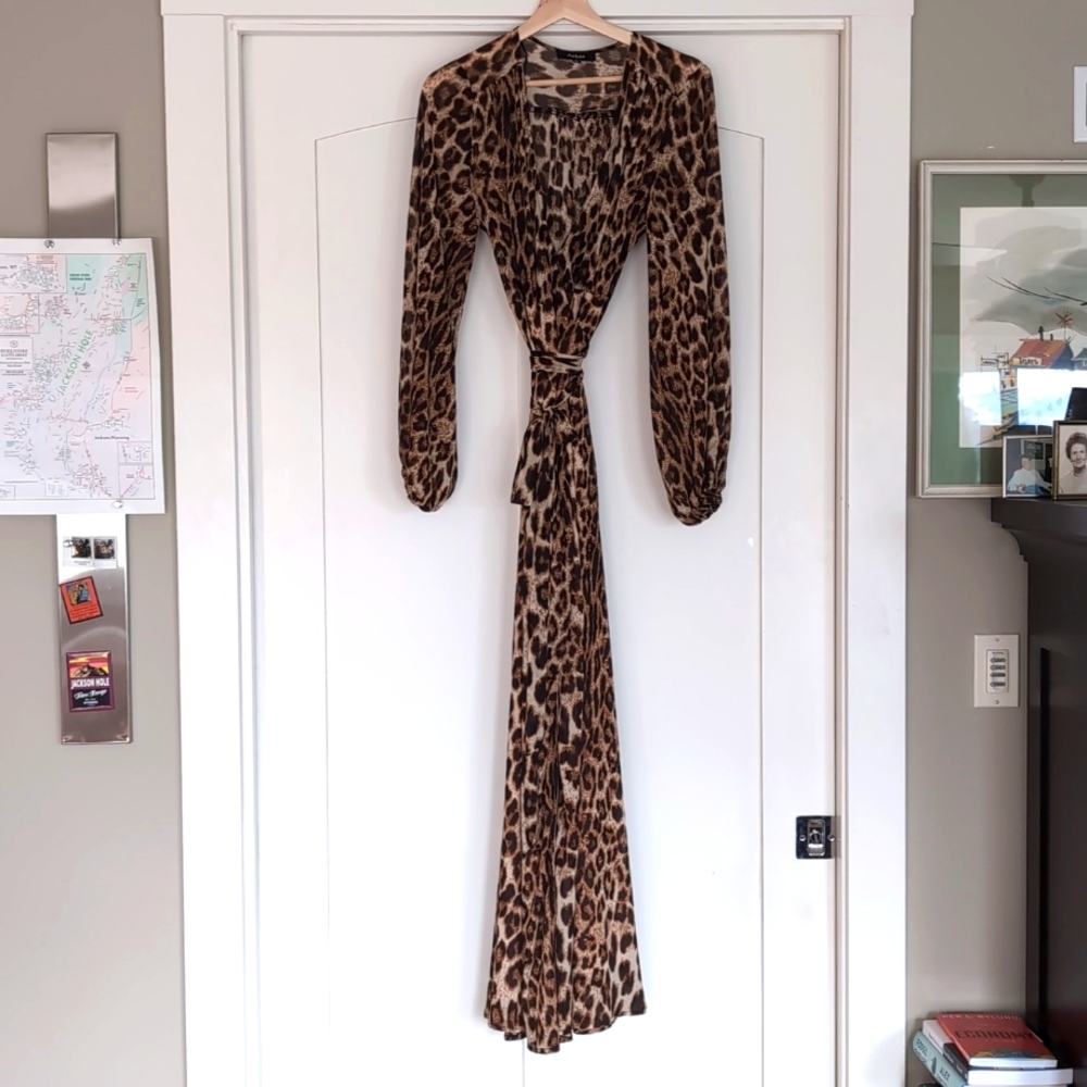 Animal print maxi dress size S but runs very large. The skirt is fully lined.